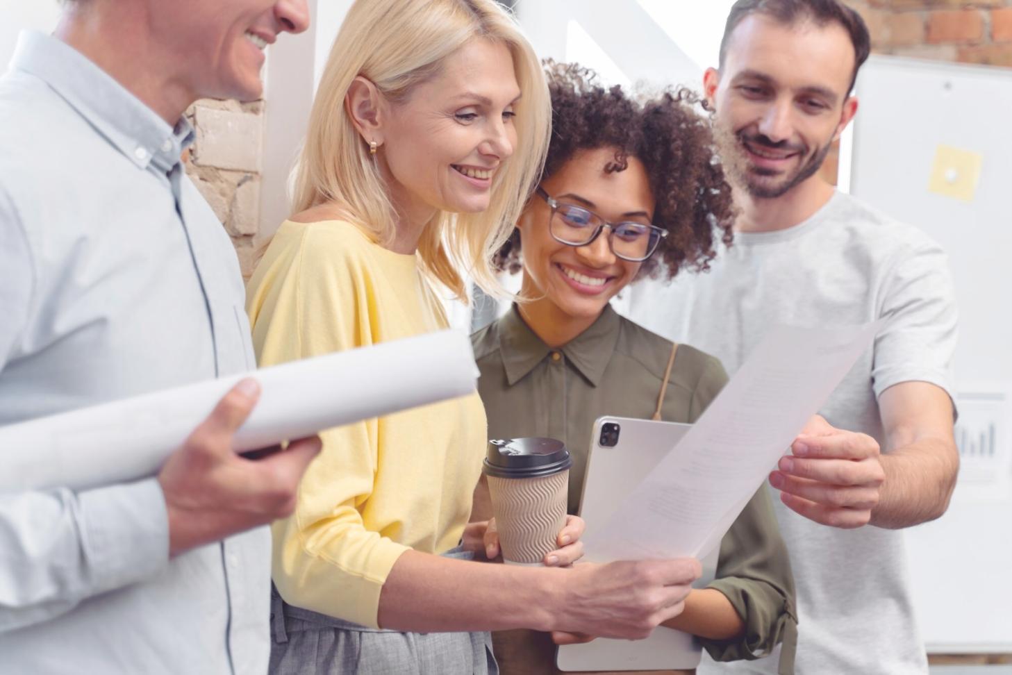 Workshop participants analyzing business data during group session